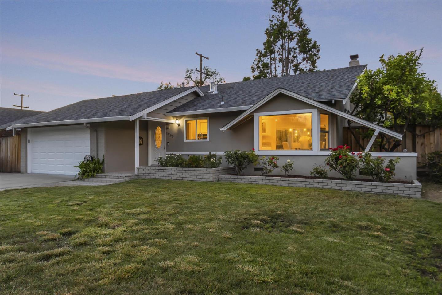 1963 Geneva Street San Jose, CA 95124 - Photo 4 of 35 a front view of a house with garden