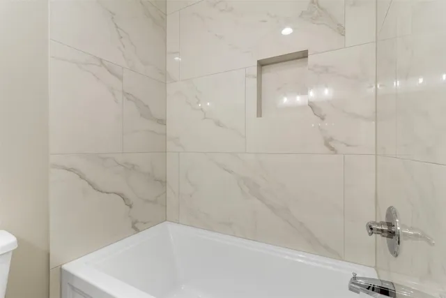 a bathroom with a bathtub