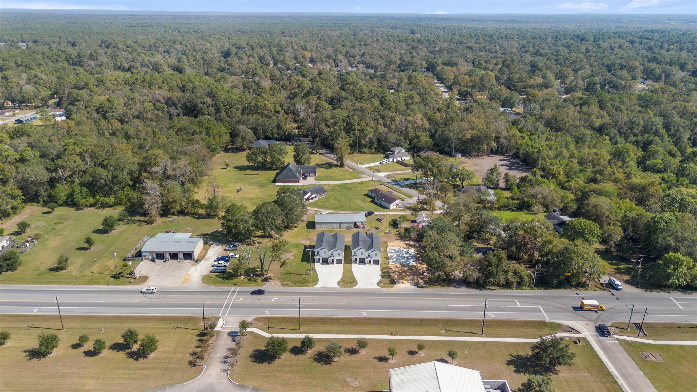 3150 South Cleveland Street Dayton, TX 77535 - Photo 22 of 24 an aerial view of residential houses with outdoor space