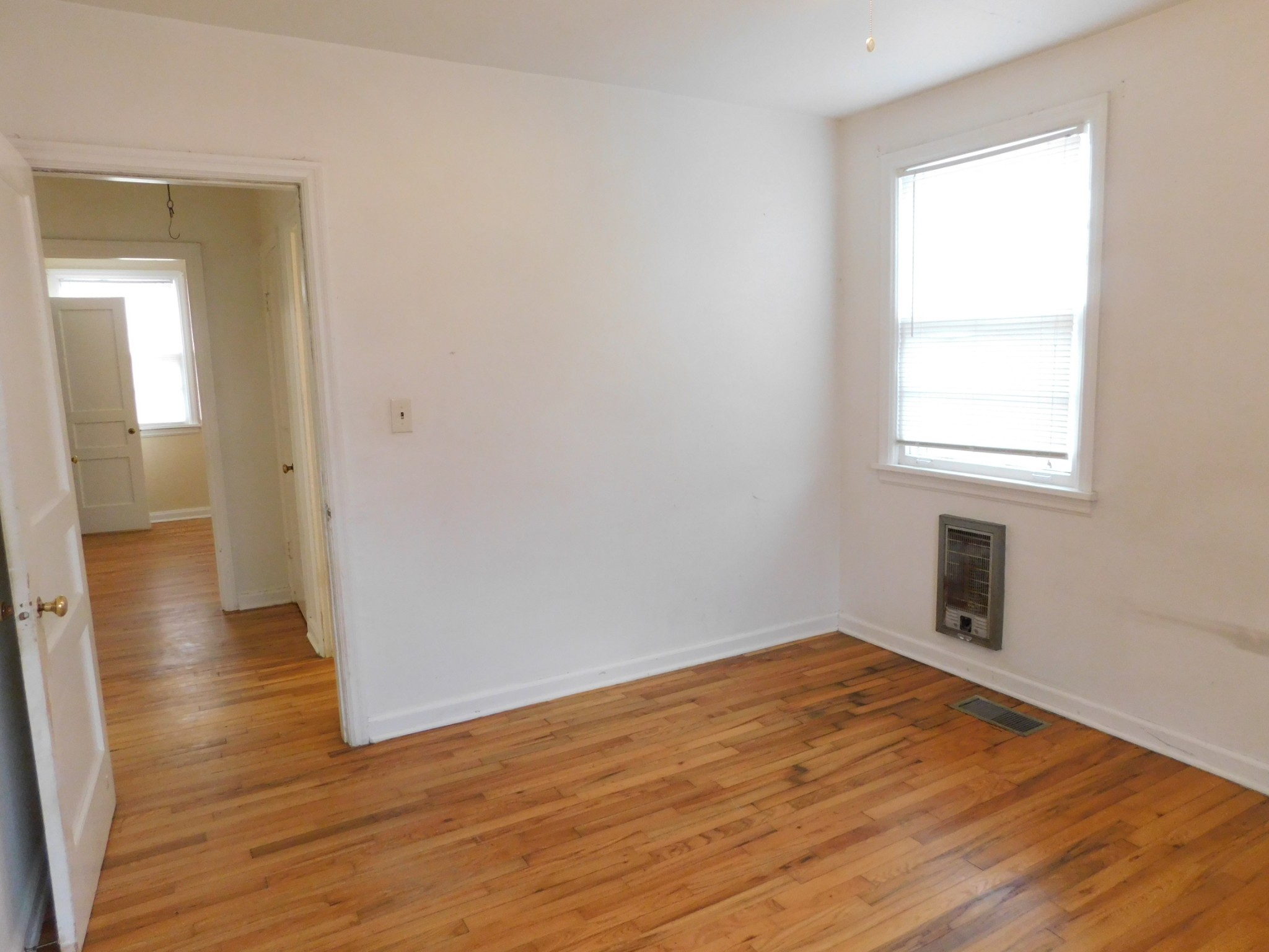 2801 Surrey Road Nashville, TN 37214 - Photo 17 of 43 an empty room with wooden floor and a window