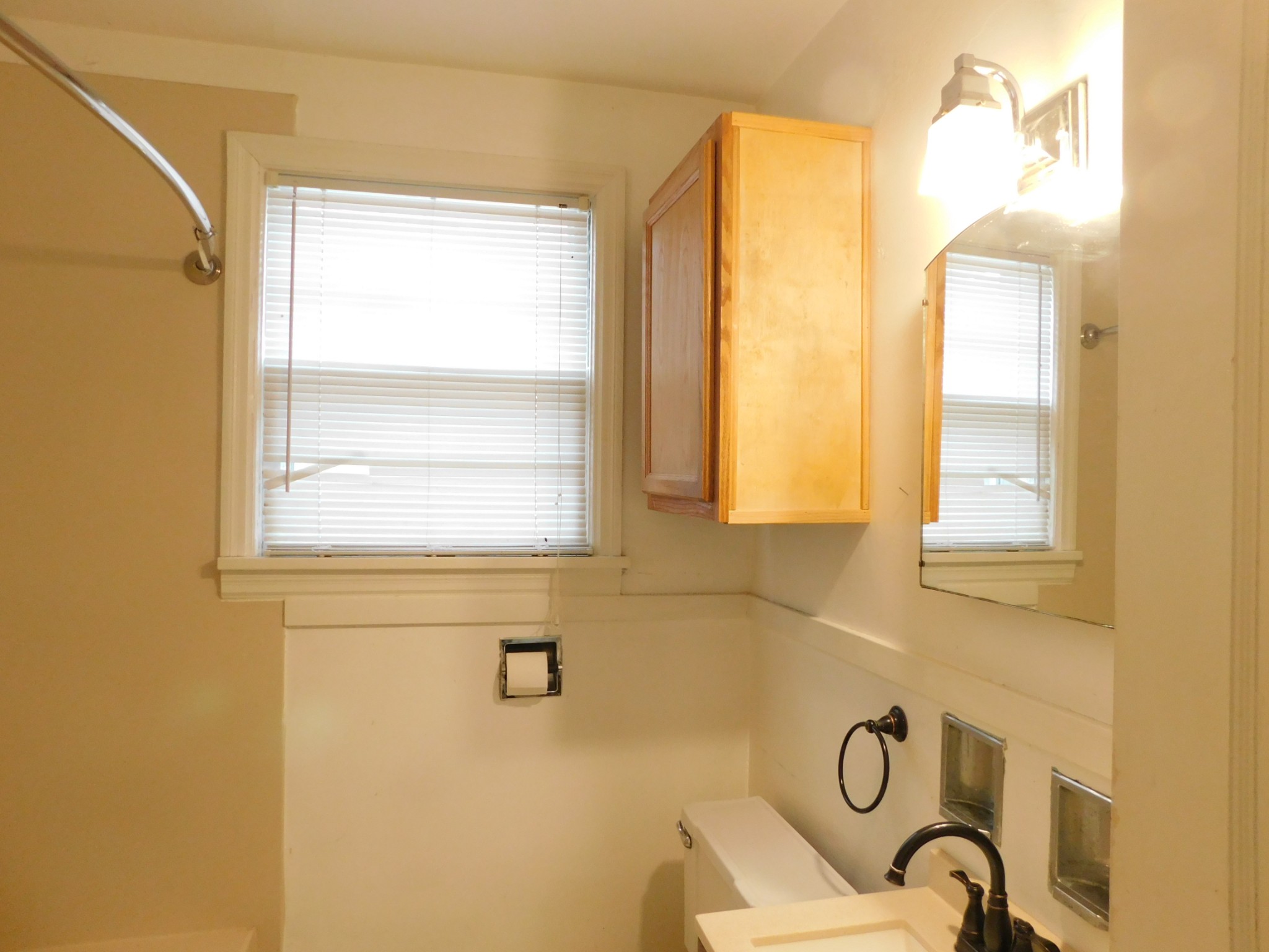 2801 Surrey Road Nashville, TN 37214 - Photo 18 of 43 a bathroom with a window a sink and a mirror
