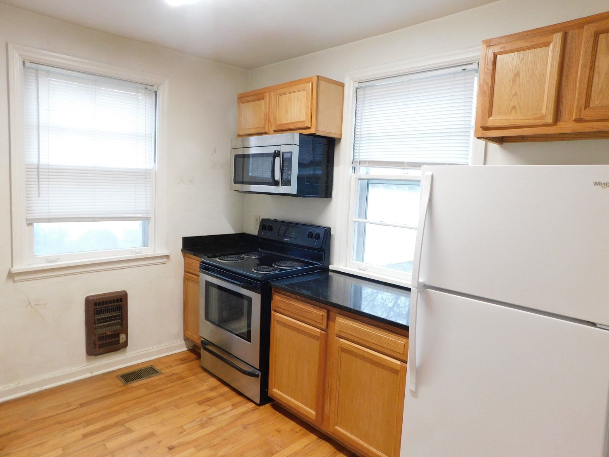 2801 Surrey Road Nashville, TN 37214 - Photo 24 of 43 a kitchen with stainless steel appliances granite countertop a stove a sink and a refrigerator