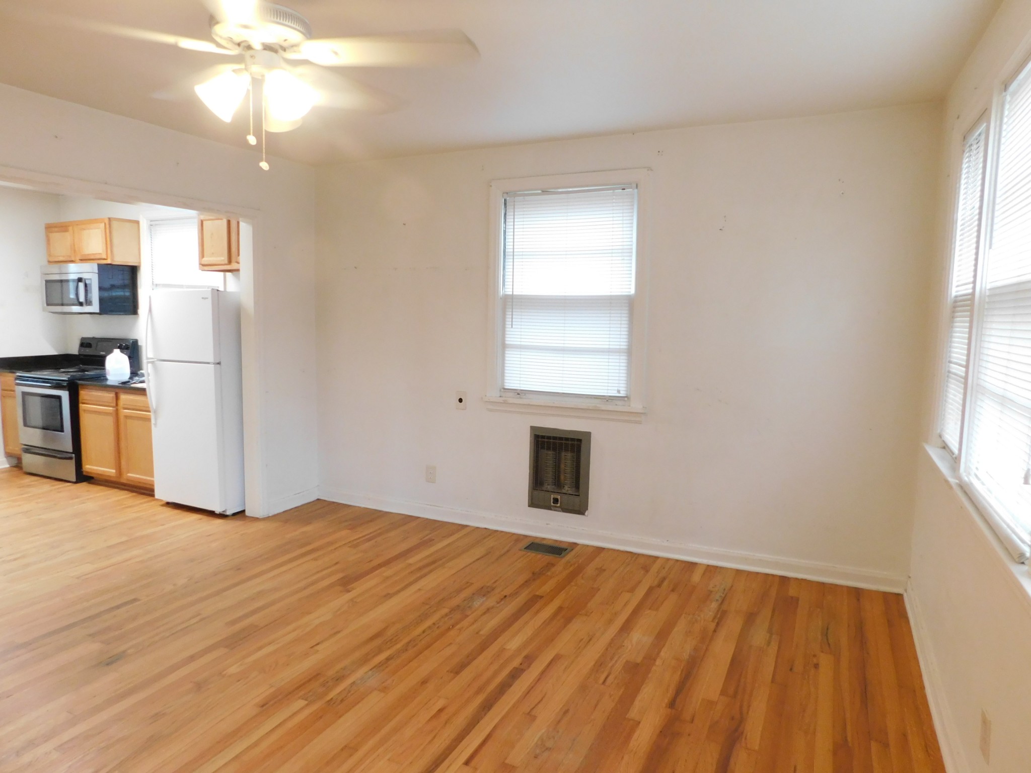 2801 Surrey Road Nashville, TN 37214 - Photo 7 of 43 a view of empty room with wooden floor and fan