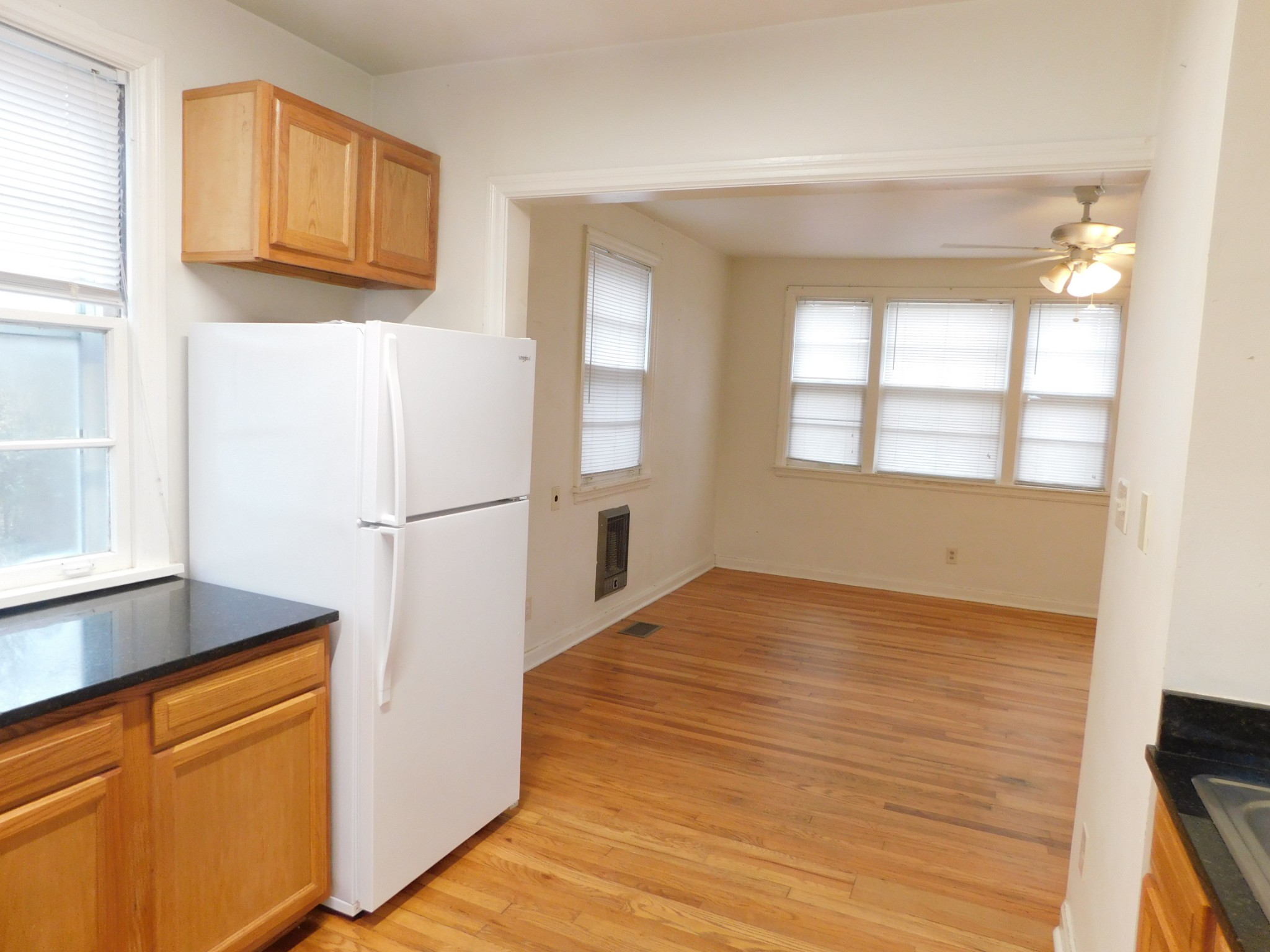 2801 Surrey Road Nashville, TN 37214 - Photo 10 of 43 a kitchen with granite countertop cabinets and wooden floor