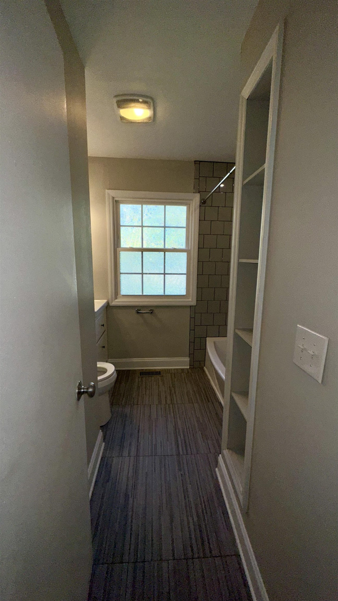 1113 Marlborough Road Raleigh, NC 27610 - Photo 11 of 28 a bathroom with a sink and a shower