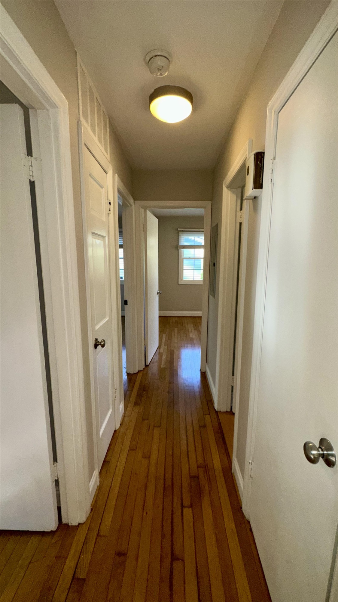 1113 Marlborough Road Raleigh, NC 27610 - Photo 21 of 28 a view of a room with wooden floor and staircase