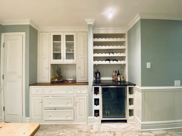 a kitchen with a stove and a cabinets