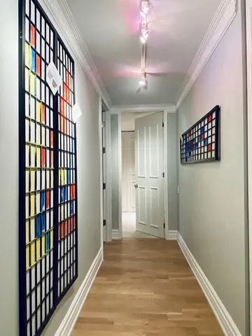 a view of a hallway with entryway