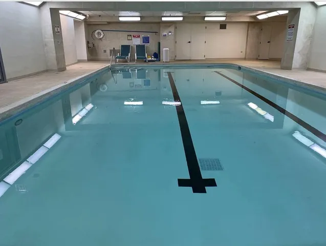 a view of a living room and bathroom