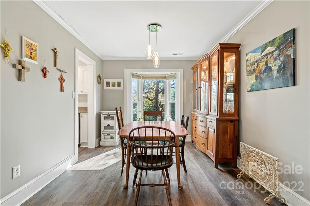 9907 Fairway Ridge Road Charlotte, NC 28277 - Photo 16 of 37 a view of a a dining room with furniture window and wooden floor