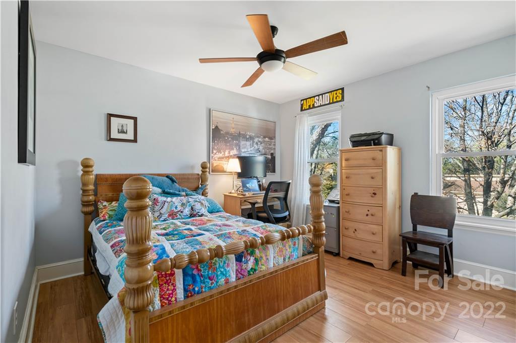 9907 Fairway Ridge Road Charlotte, NC 28277 - Photo 25 of 37 a bedroom with furniture and a bed
