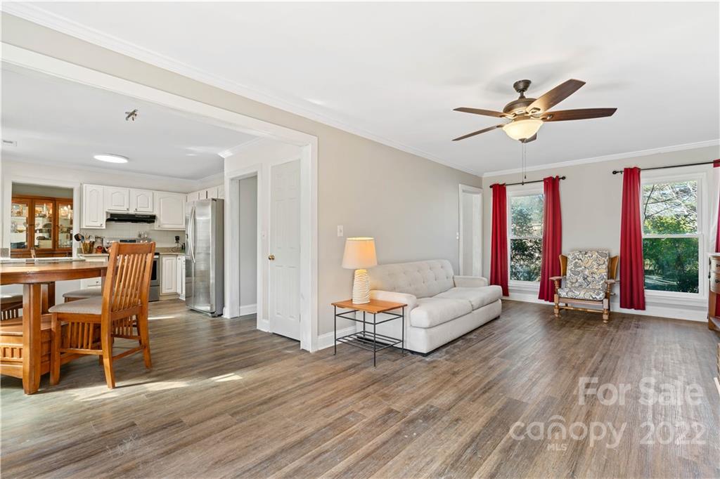 9907 Fairway Ridge Road Charlotte, NC 28277 - Photo 3 of 37 a living room with furniture and a wooden floor