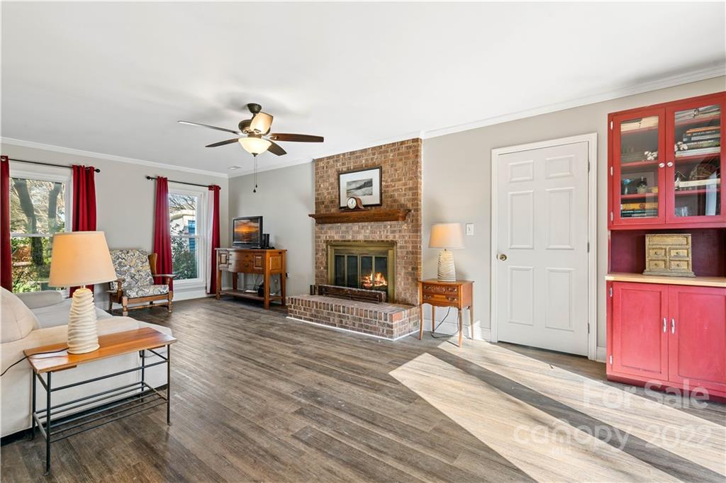 9907 Fairway Ridge Road Charlotte, NC 28277 - Photo 6 of 37 a living room with furniture and a fireplace
