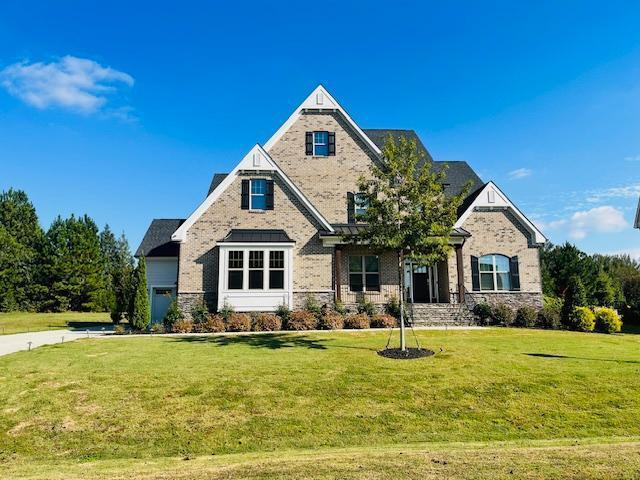 1717 Banks View Drive Raleigh, NC 27603 - Photo 1 of 33 a front view of house with yard and green space