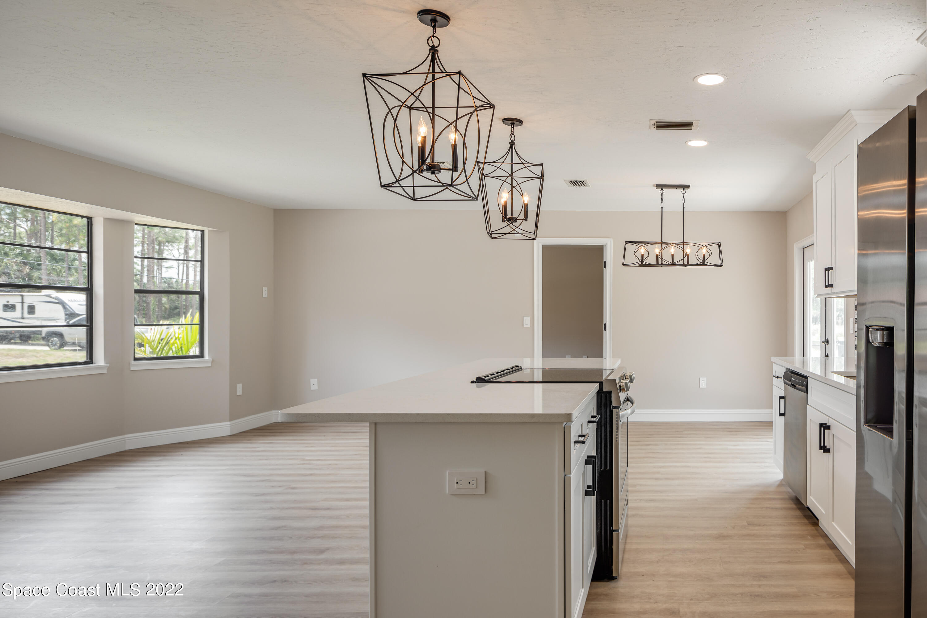 1011 Thompson Road Southwest Palm Bay, FL 32908 - Photo 7 of 17 a view of a kitchen with a window