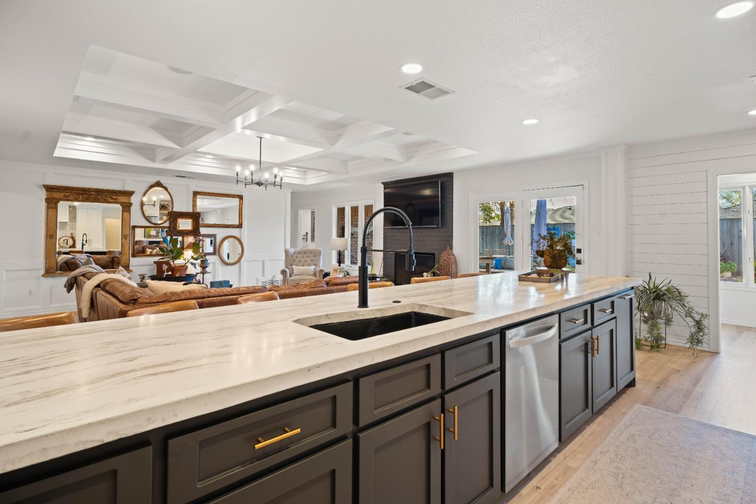 5409 88th Street Lubbock, TX 79424 - Photo 6 of 23 a kitchen with sink and view of living room