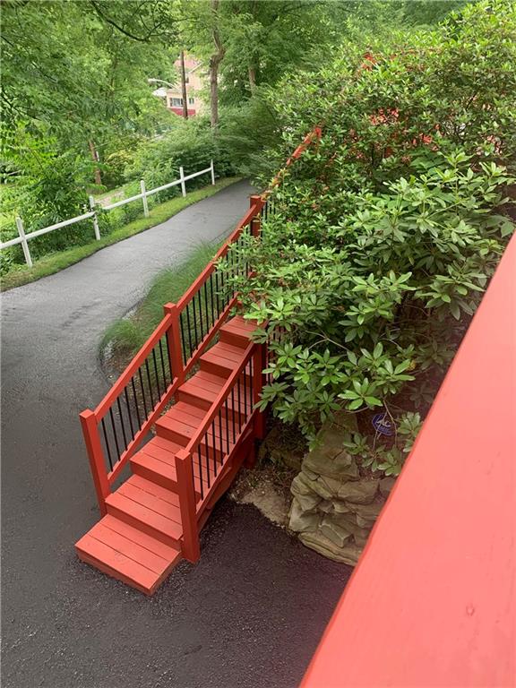 2618 New England Road West Mifflin, PA 15122 - Photo 20 of 25 a balcony with tall trees