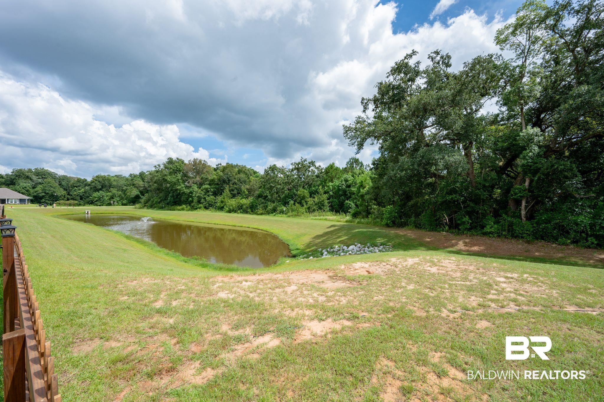 681 Calibre Street Fairhope, AL 36532 - Photo 55 of 56 View of yard with a water view