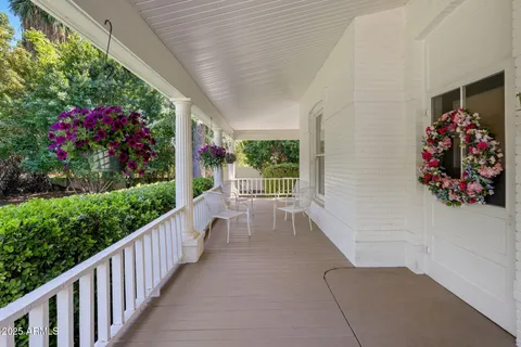 a view of a porch with furniture