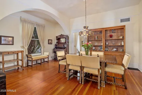 a view of a livingroom with furniture and wooden floor