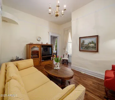 a living room with furniture and a table