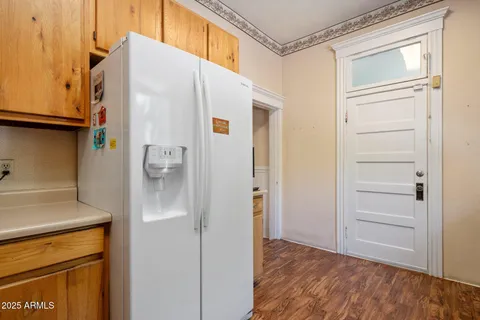 a kitchen with stainless steel appliances granite countertop a sink a stove and a cabinets