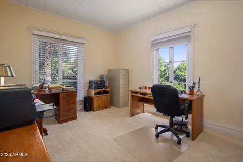a view of swimming pool with a tree