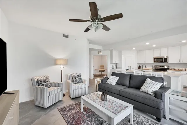 a bathroom with a toilet and a mirror