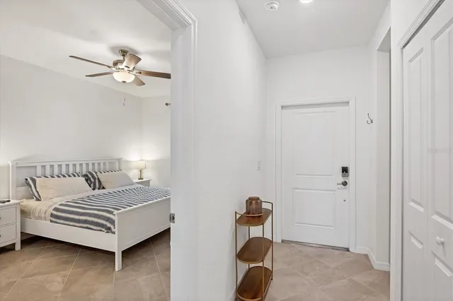 a bathroom with a sink a toilet a mirror and vanity