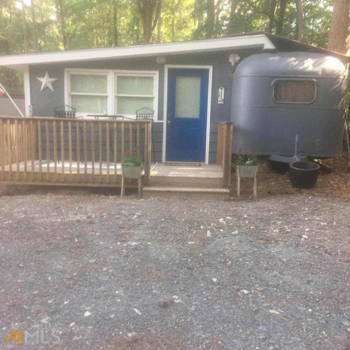 5400 Kings Camp Road Southeast, Unit A3 Acworth, GA 30102 - Photo 1 of 1 a view of a house with a backyard