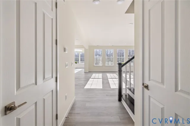 a view of a hallway with windows