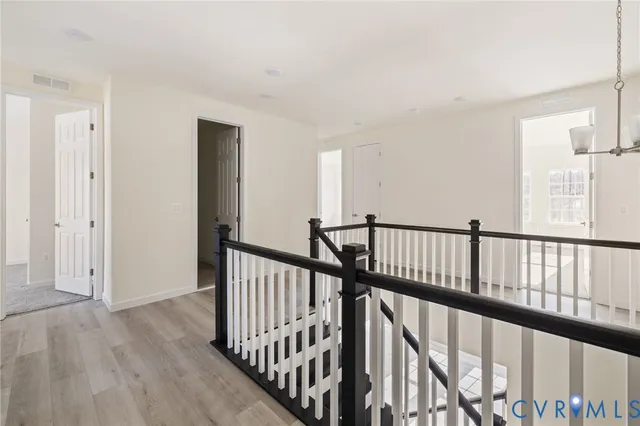 a view of staircase with rug floor