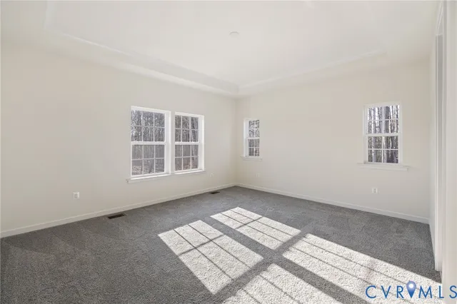 a bathroom with a shower sink and mirror