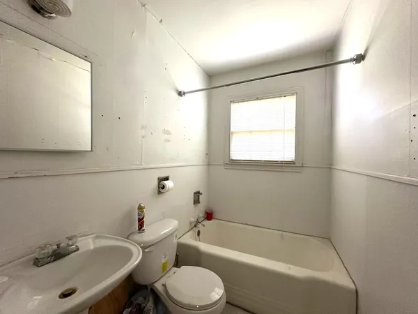 a kitchen with a stove and a sink