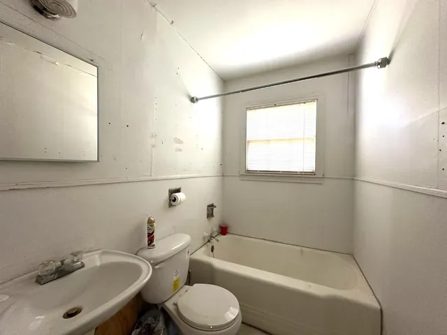 a kitchen with a stove and a sink