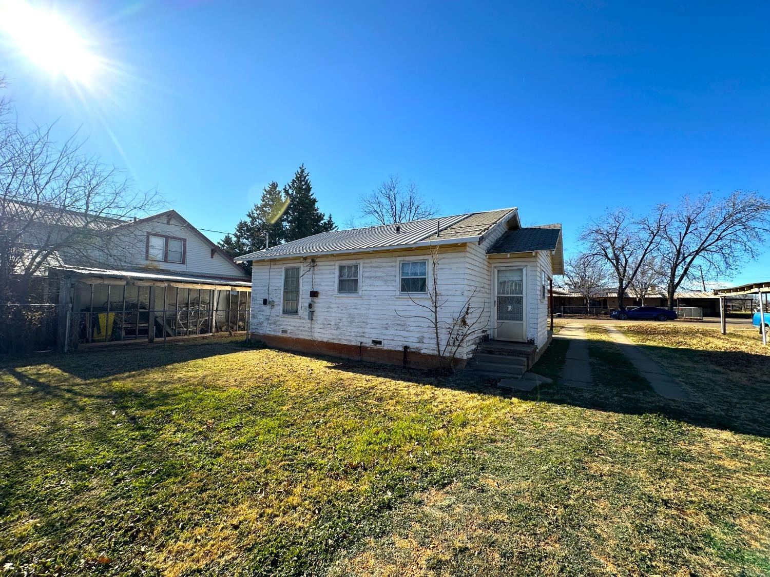 610 Trumbull Avenue Spur, TX 79370 - Photo 7 of 14 a view of a house with a yard