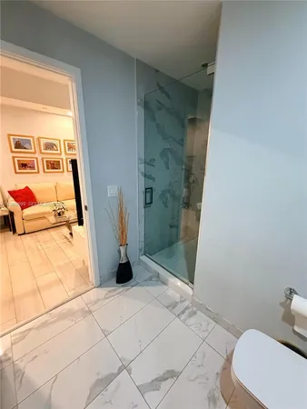 a bathroom with a sink a toilet and bathtub