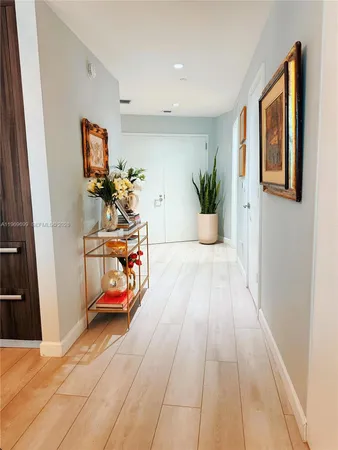 a vase of flowers sitting on a table