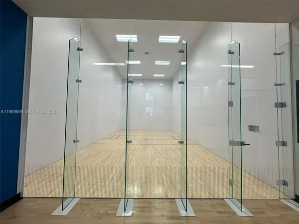 a view of a swimming pool with outdoor seating