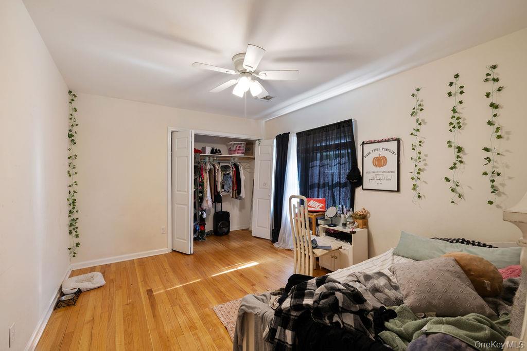 30 Chestnut Street Stony Point, NY 10980 - Photo 11 of 34 a bedroom with a bed and a walk in closet