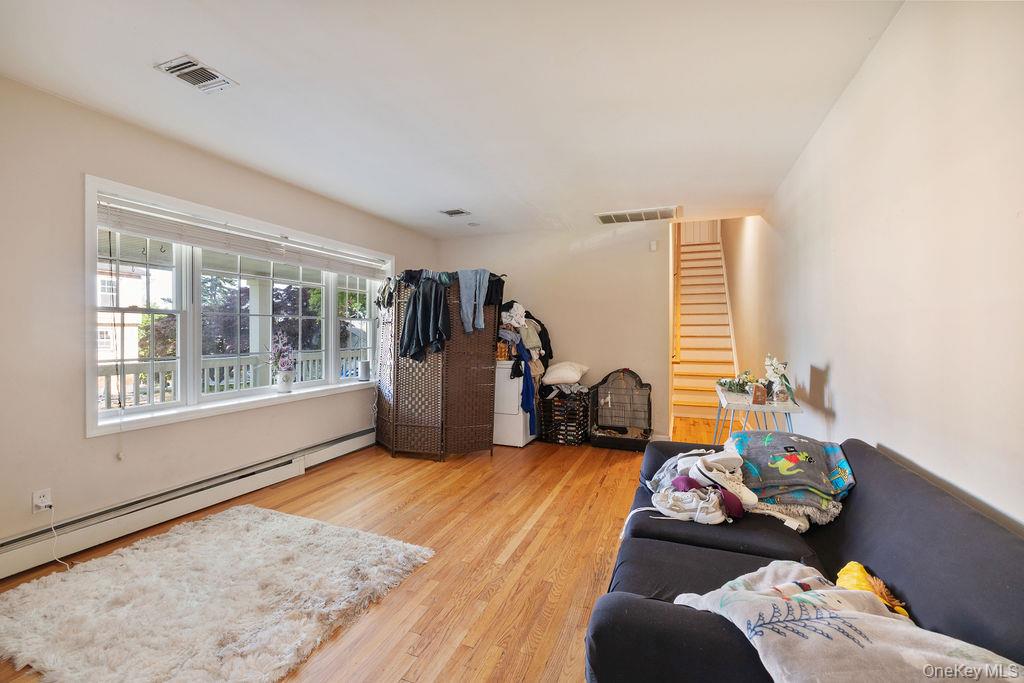 30 Chestnut Street Stony Point, NY 10980 - Photo 13 of 34 a living room with furniture and a window