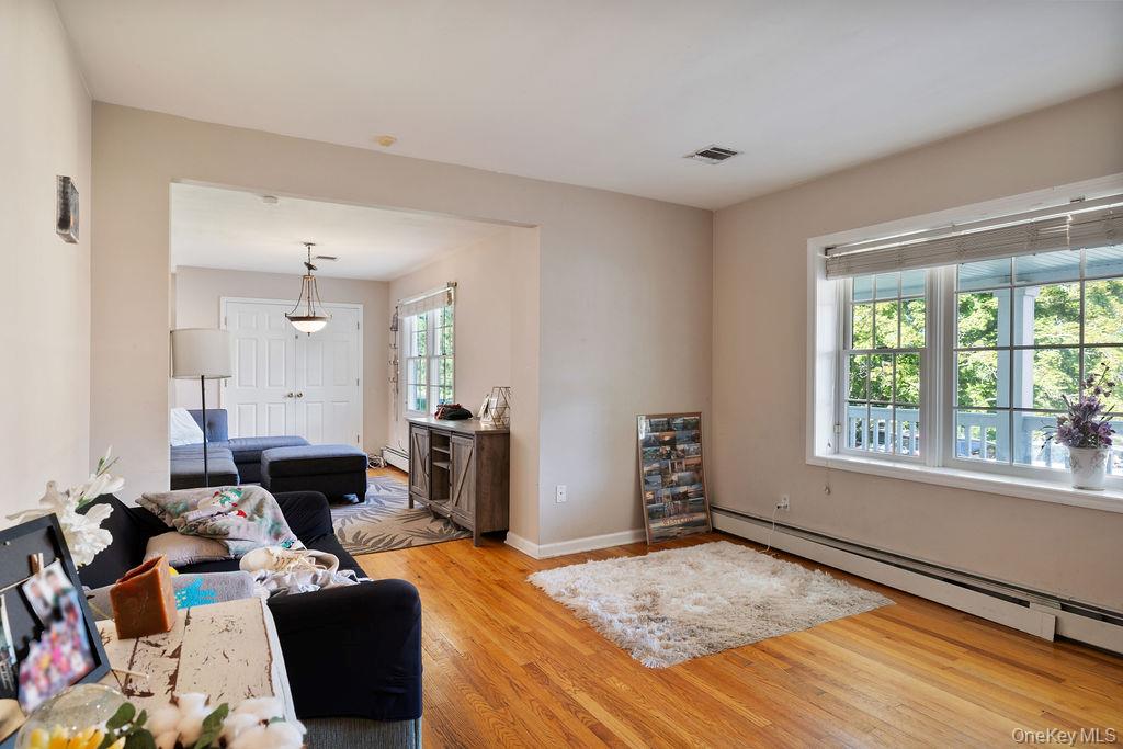 30 Chestnut Street Stony Point, NY 10980 - Photo 15 of 34 a living room with furniture window and a wooden floor