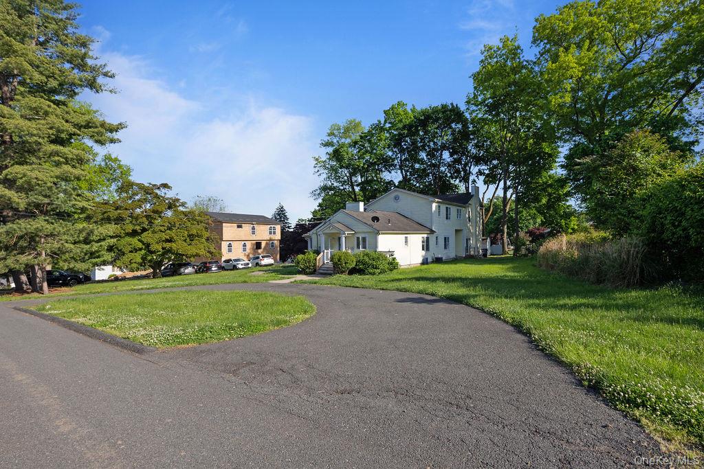 30 Chestnut Street Stony Point, NY 10980 - Photo 25 of 34 a view of a big house with a big yard and large trees