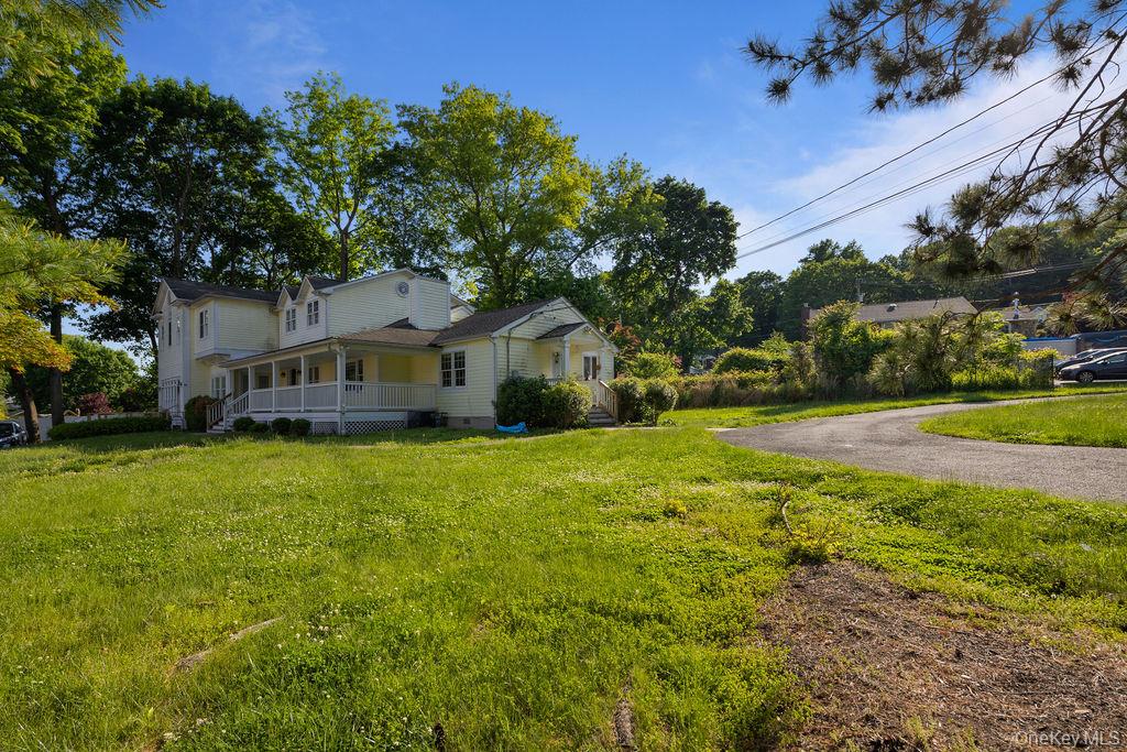 30 Chestnut Street Stony Point, NY 10980 - Photo 28 of 34 a front view of a house with yard and green space