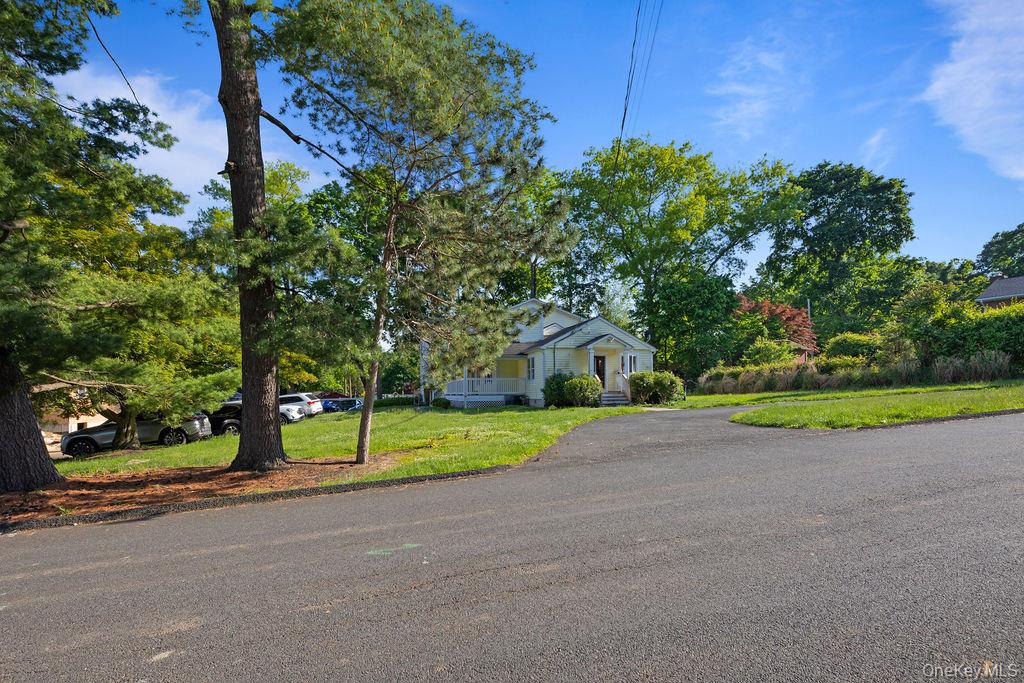 30 Chestnut Street Stony Point, NY 10980 - Photo 34 of 34 a view of a house with a yard and large trees