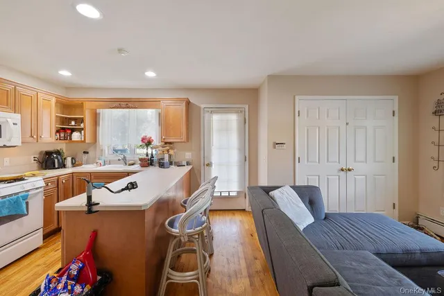 a view of a kitchen and dining room