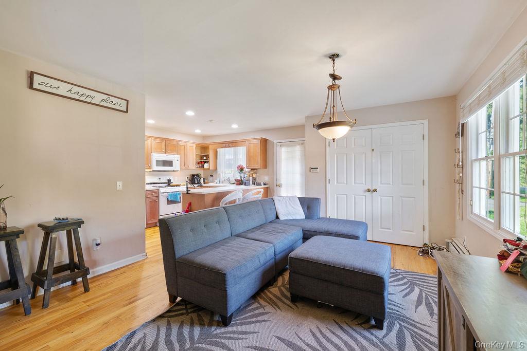 30 Chestnut Street Stony Point, NY 10980 - Photo 7 of 34 a living room with furniture a window and wooden floor