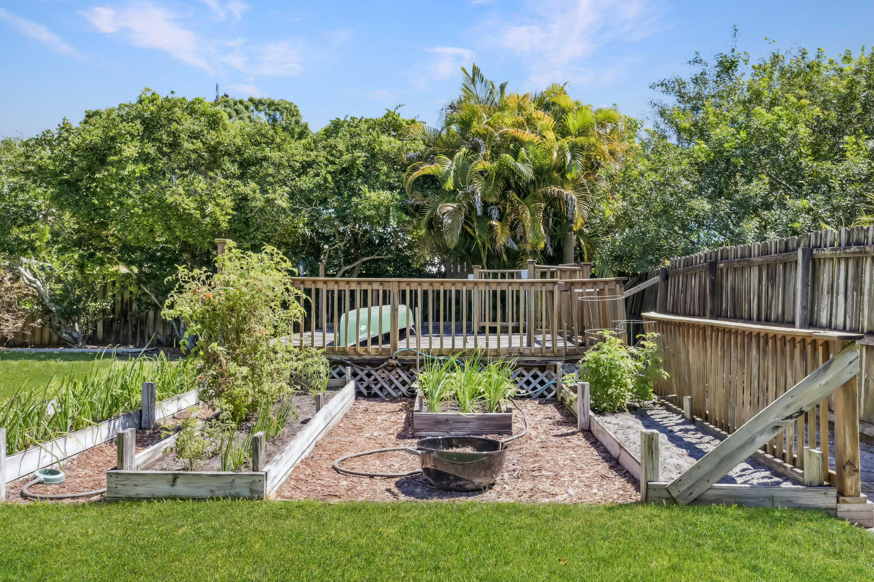 1851 Tallpine Road Melbourne, FL 32935 - Photo 27 of 35 Wooden deck and garden area