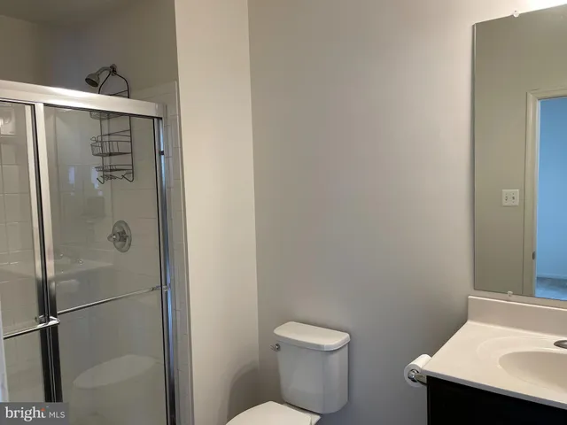 a bathroom with a toilet and a sink