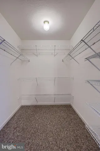 a view of a room with racks on the wall